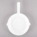 A white round Tablecraft fry pan with a handle.