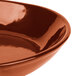 A shiny copper Tablecraft fry pan server with an open handle.