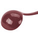A close-up of a Tablecraft maroon speckle long ladle.