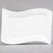A CAC Miami rectangular bone white porcelain platter with a curved edge.