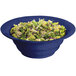 A Tablecraft blue speckle salad bowl filled with salad on a white background.