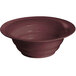 A maroon speckled cast aluminum bowl with a wide rim.