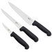 A Victorinox 3 piece chef knife set with black handles.