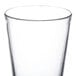 A clear plastic footed pilsner glass.