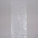 A clear plastic bag with handles containing a white background.