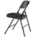 A National Public Seating black metal folding chair with a black vinyl padded seat.
