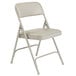 National Public Seating 1202 Gray Metal Folding Chair with 1 1/4" Warm Gray Vinyl Padded Seat Main Thumbnail 2