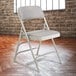 National Public Seating 2302 Gray Metal Folding Chair with 1 1/4" Graystone Fabric Padded Seat Main Thumbnail 1