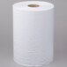 A white roll of Lavex hardwound paper towel on a gray surface.