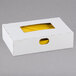 A white box of Bedford Industries Inc. yellow paper bag ties.