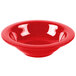 A red melamine bowl with a speckled rim.