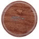A Cambro Country Oak fiberglass tray with a circular surface.