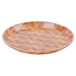 A round brown Cambro fiberglass tray with a basketweave pattern.