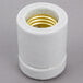 A white plastic Nemco socket with a gold ring.