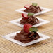 Three Fineline white tiny square trays of chocolate desserts.