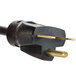 A black and gold plug with a 220V cord for a Nemco Heated Butter Spreader.