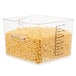 A Rubbermaid clear plastic food storage container with pasta in it.