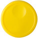 A yellow plastic disc with a white circle in the middle.
