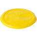 A yellow plastic lid with an oval shape.