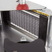 A sharp scalloped blade assembly for a Vollrath InstaSlice cutter with a red ball.