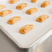 Baker's Mark 12" x 16" Half Size Silicone Coated Parchment Paper Bun / Sheet Pan Liner Sheet - 100/Pack Main Thumbnail 5