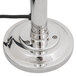 A Hanson Heat Lamps chrome freestanding heat lamp with a 7" round base.