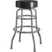 A Lancaster Table & Seating black vinyl double ring swivel bar stool with a metal base.