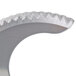 A Robot Coupe fine serrated "S" blade with a curved edge.