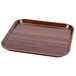 A square brown Cambro fiberglass tray with a wood grain finish.