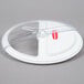 A white Rubbermaid plastic lid with clear plastic scoop holder.