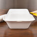 Bare by Solo HC6SC-2050 Eco-Forward 6" x 6" x 3" Sugarcane / Bagasse Take-Out Container - 400/Case Main Thumbnail 4