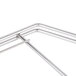 A Metro stainless steel wall mount frame for five 18" wide shelves with metal rods.
