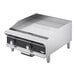 A Vollrath stainless steel countertop gas flat top grill with thermostatic control.