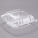 A Dart ClearSeal clear plastic container with a square lid.