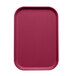 A cherry red rectangular Cambro tray insert.
