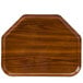 A rectangular wooden Cambro tray with a brown finish.