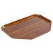 A rectangular Cambro Burma Teak fiberglass tray with a brown finish.