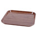 A brown square Cambro Country Oak fiberglass tray.