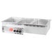A stainless steel APW Wyott drop-in hot food well with three compartments.