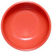 A close-up of a red Elite Global Solutions melamine bowl.