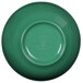 A green Elite Global Solutions melamine bowl with a white rim.