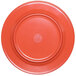 An orange melamine plate with a red spring design.