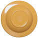 A yellow melamine bowl with a circular design on the inside.