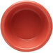 A close-up of a red Elite Global Solutions melamine ramekin with a white background.