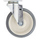 A white and metal swivel castor for Cambro products.