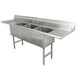 A stainless steel Advance Tabco three compartment commercial sink with two drainboards.