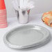 Creative Converting 433281 12" x 10" Shimmering Silver Oval Paper Platter - 96/Case Main Thumbnail 3