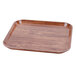 A square java teak fiberglass tray with a brown finish.