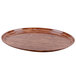A wooden oval Cambro Java Teak tray with a handle.