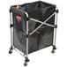 A Rubbermaid laundry cart with black X-frame and wheels.